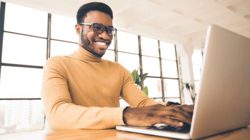 Person on Laptop Subscribing